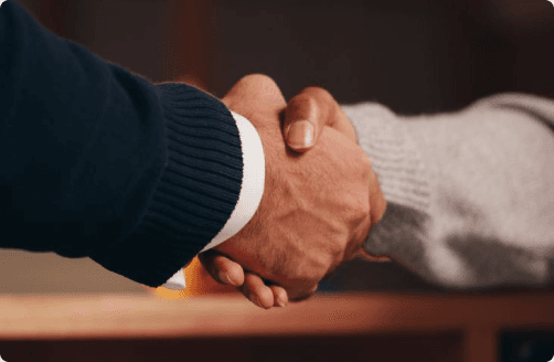 Business partners shaking hands